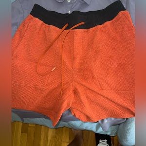 Lululemon waffle shorts orange / red color